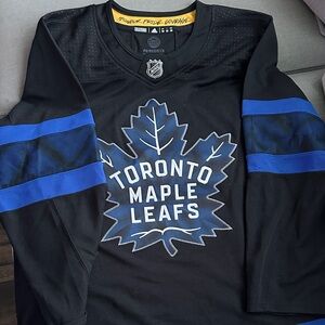 Drew reversible Black and Gold NHL Hockey Jersey with 'Honour. Pride. Courage.'